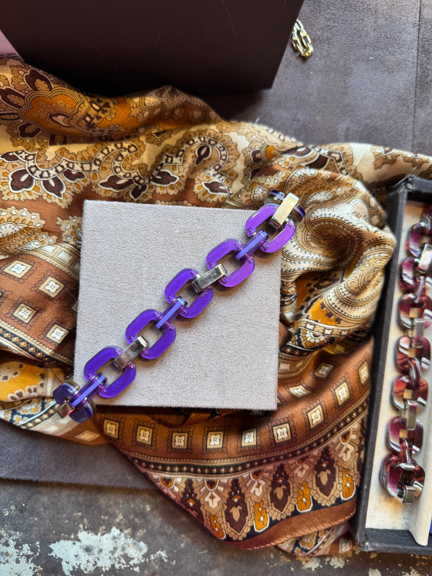 Purple bracelet.