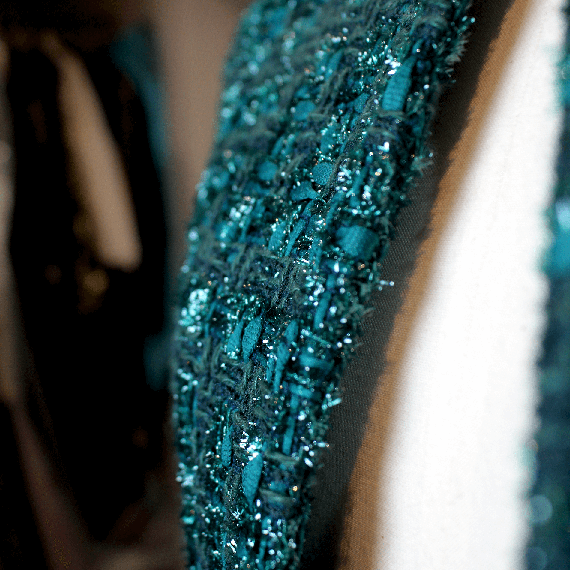 EdNerat emerald green handmade women's coat closeup of the material texture.
